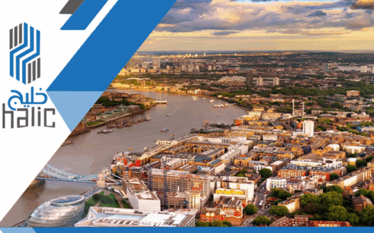 Aerial view of London skyline with real estate towers and Thames River